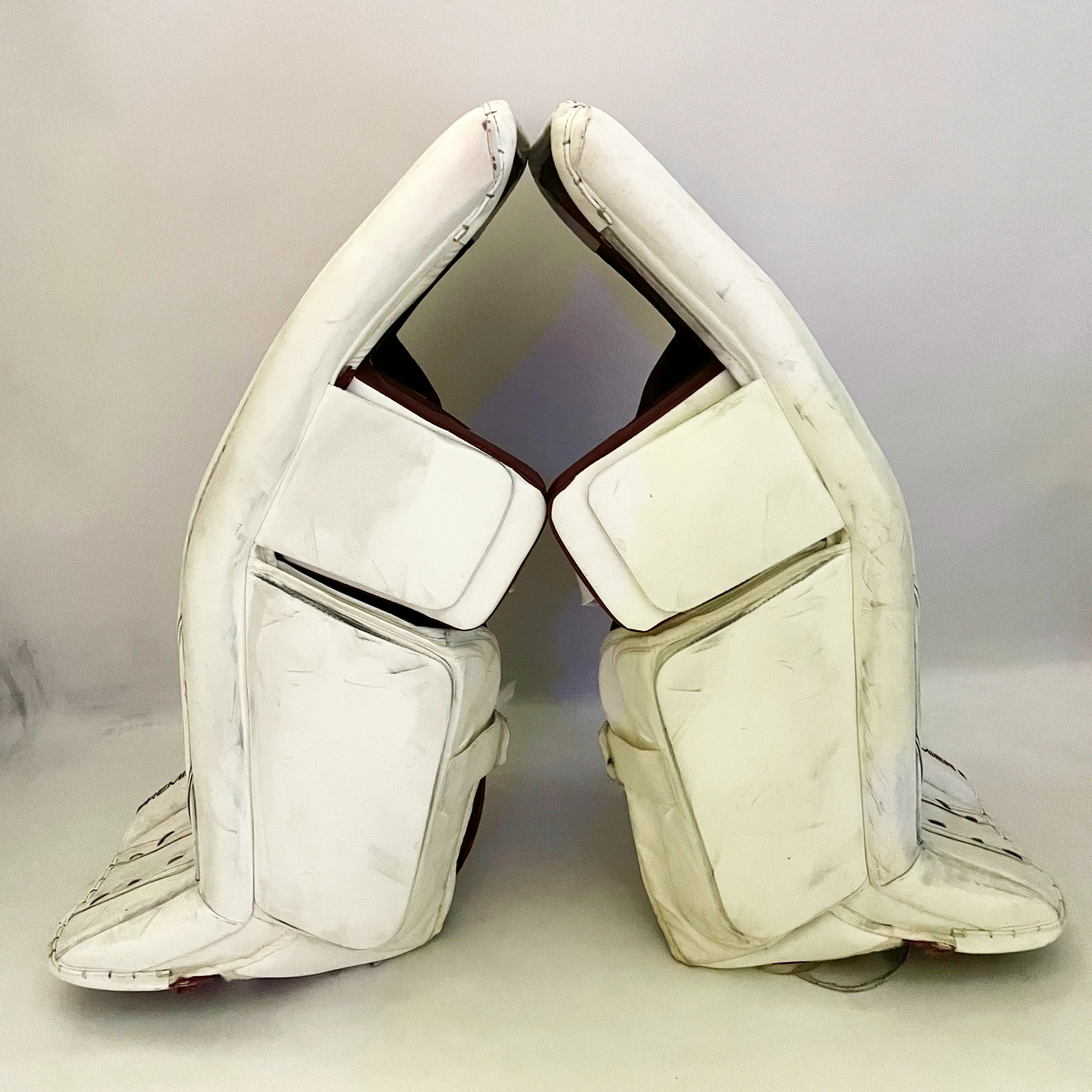 CCM Premier II - Used Pro Stock Goalie Pads (White/Maroon)